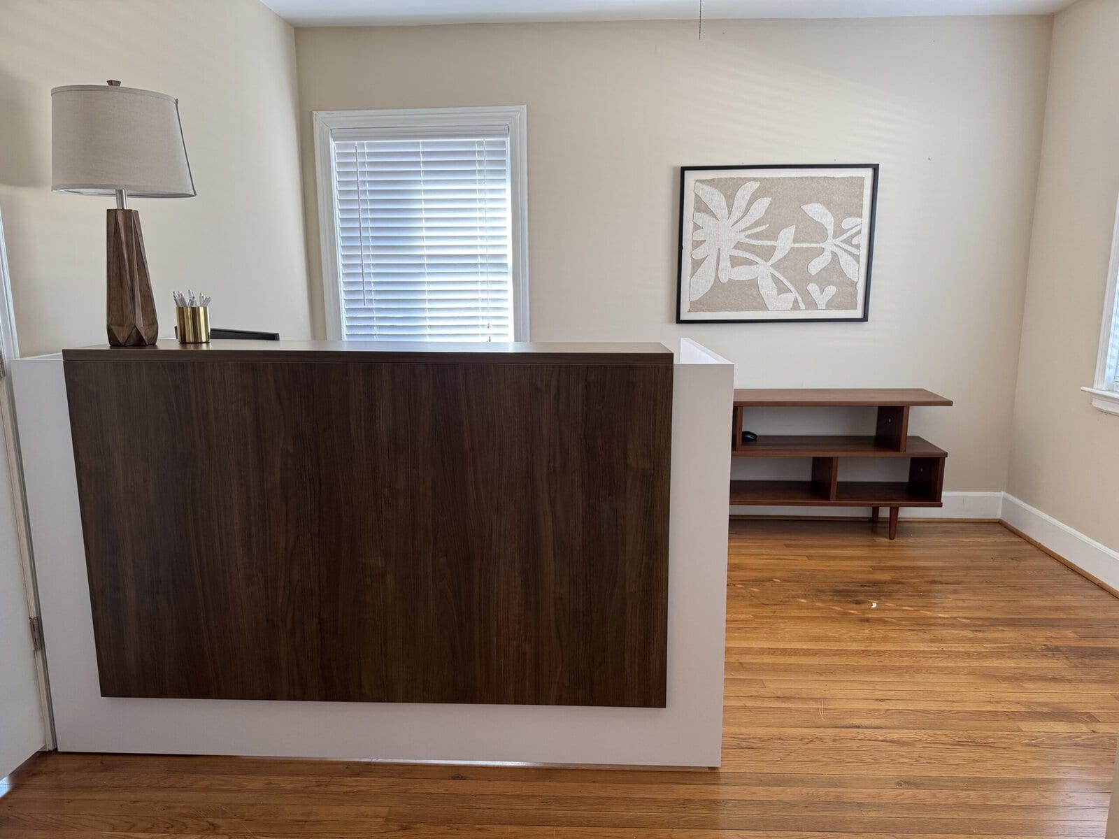 Wood reception desk in the Blythewood office