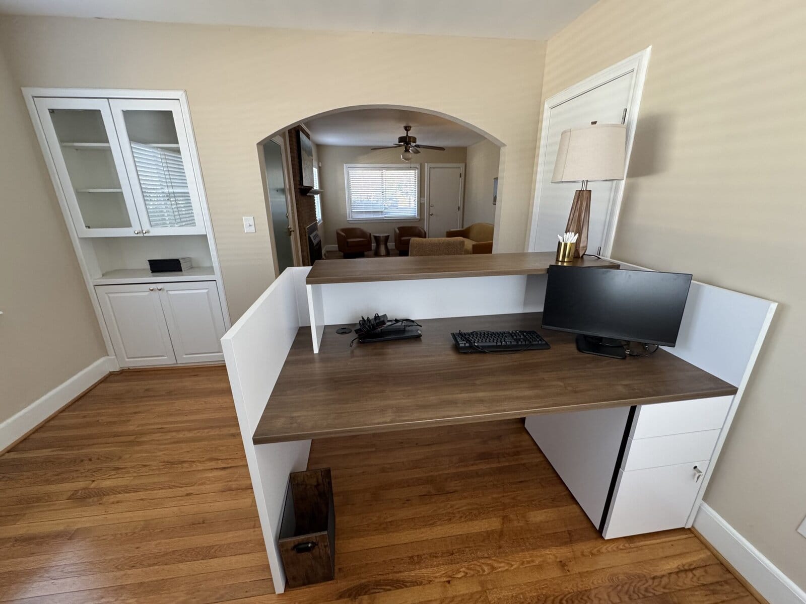 Front desk at the Blythewood office, looking through an arch toward the waiting room