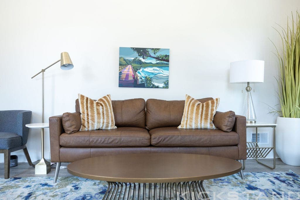 Brown leather sofa and coffee table in the Columbia office lounge