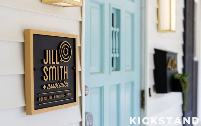 Jill Smith + Associates sign beside the teal Lexington office door